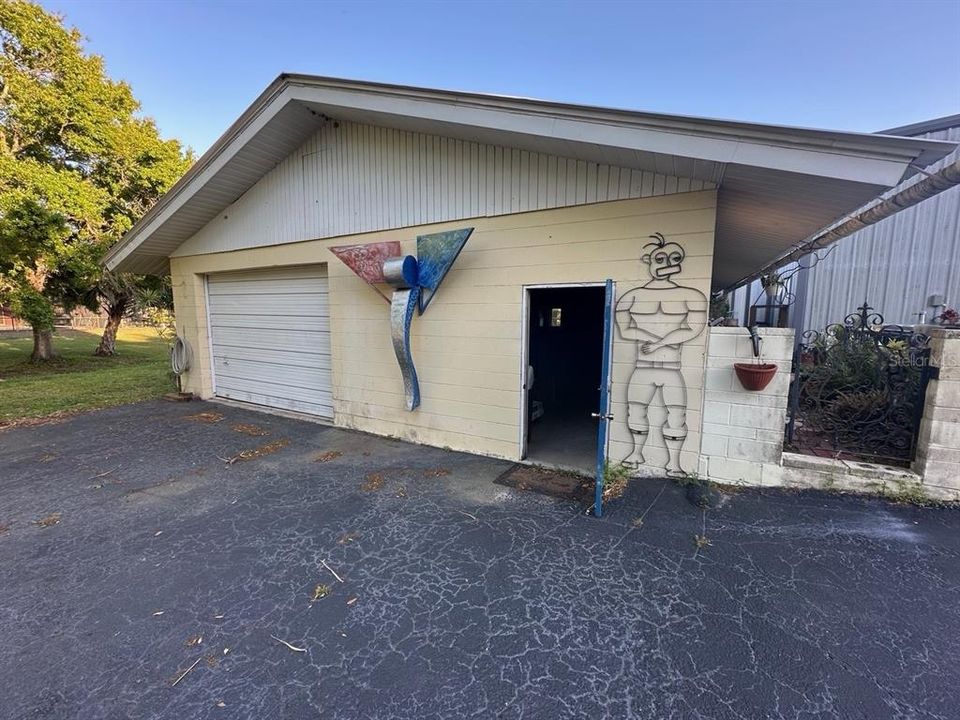2nd outbuilding with garage and workshops