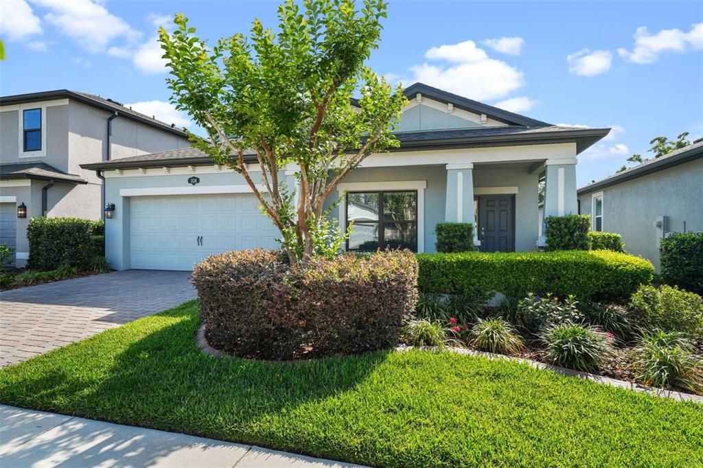 Front of home with view of landscaping