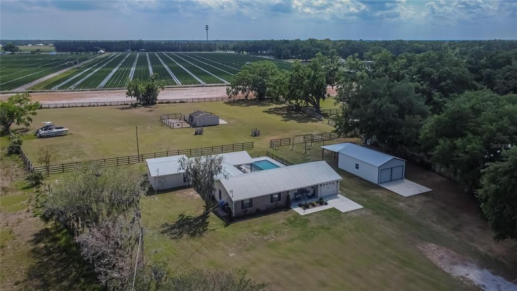Main house, apartment, metal building, barn, crossed fenced -3 acres