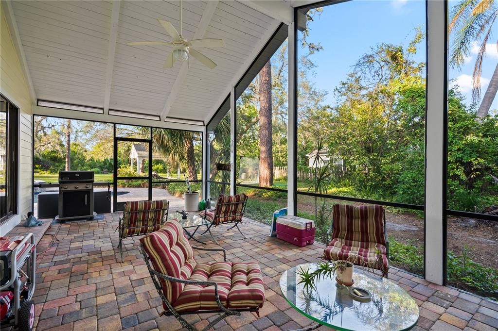 Vaulted ceilings over-sized screened patio