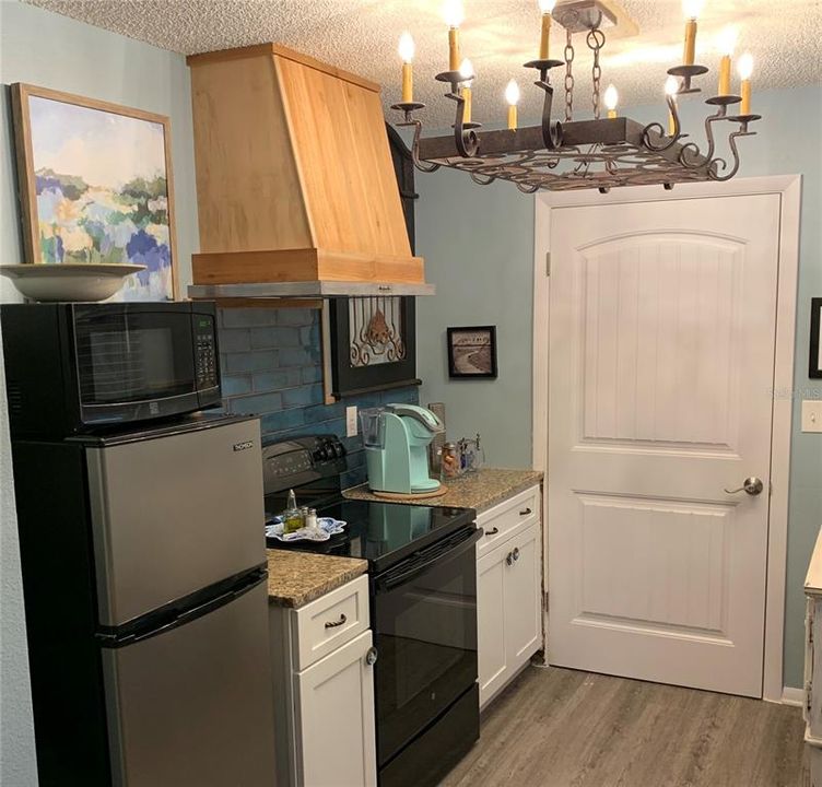 Kitchen with furniture sink base