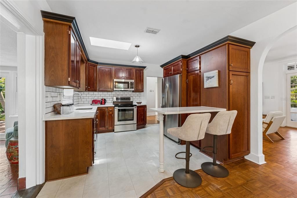 Real wood cabinetry, high end quartz countertops and gleaming stainless steel appliance. A kitchen for a gourmet chef in our opinion!