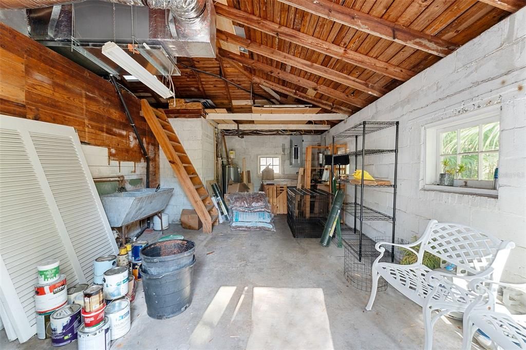 Garage space ready to be utelized as a art studio, wood working shop or extra storage.
