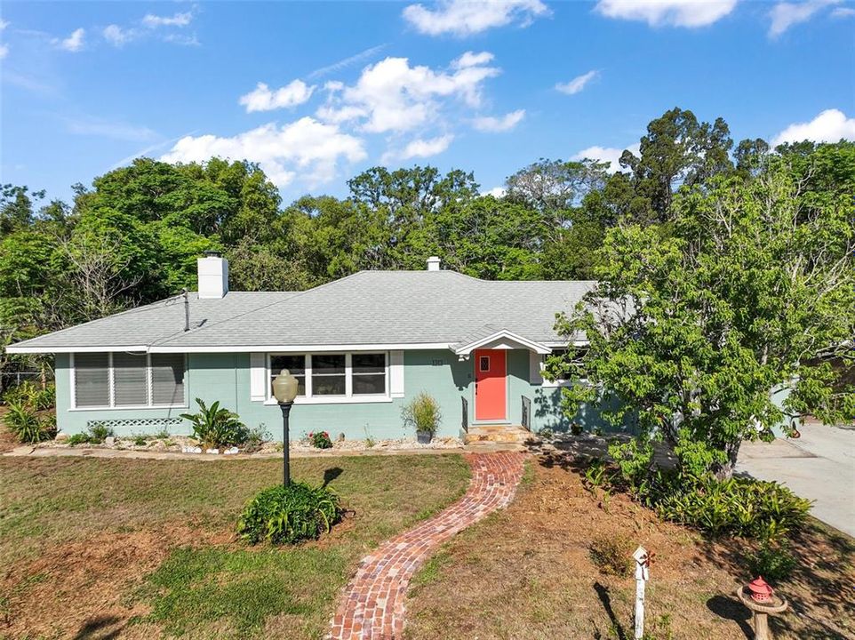 With its cheerful curb appeal and classic mid-century charm, 1313 Crestview Dr. welcomes you home.