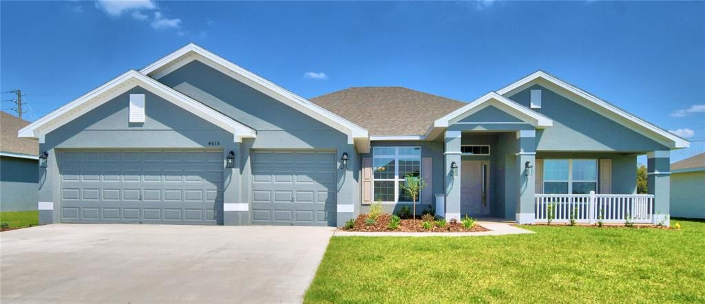 Photos of a completed home. Colors/finishes may vary. This home does not have the front porch.