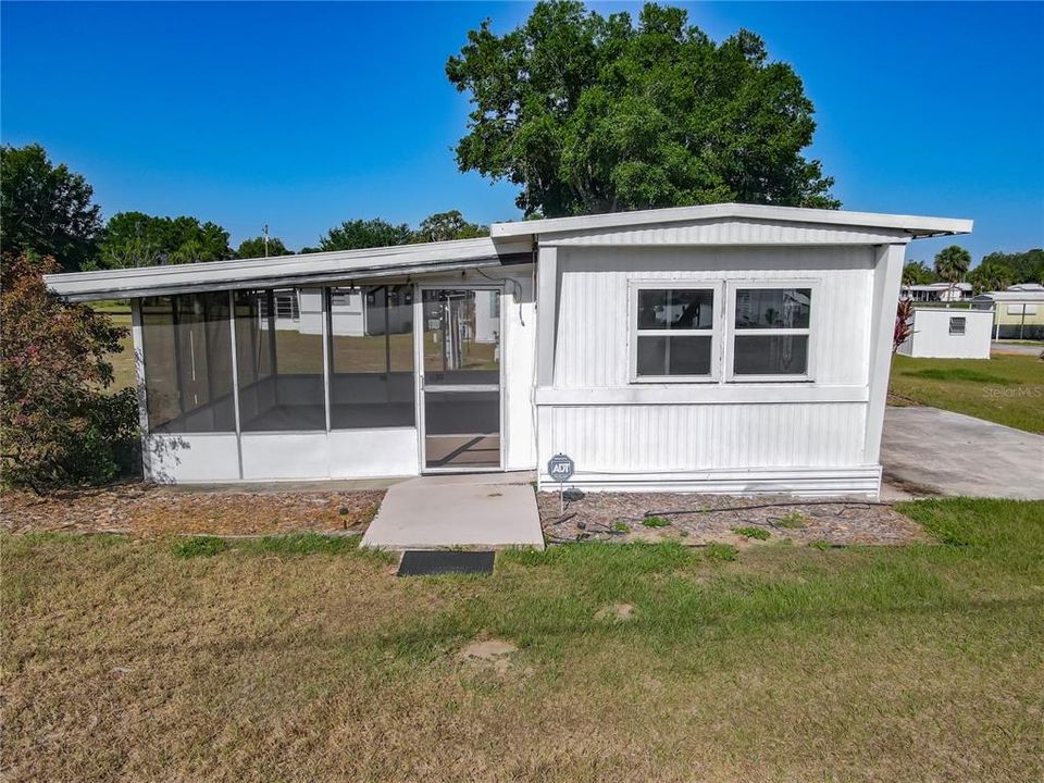 .  Located just across the street from Bob’s Landing and Marina on Crooked Lake — one of the most pristine and desirable lakes in Florida — this home is ideal for anyone who loves boating, fishing, or simply being near the water.