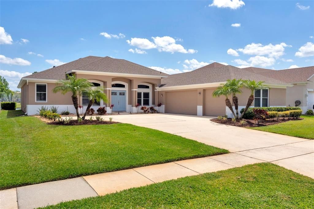 Front of house w 3 car garage