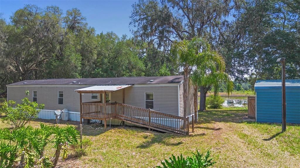 3/2 home pond view home on 6 acres with huge metal building.