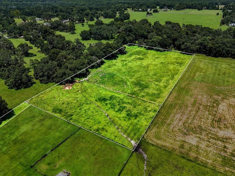 На продажу: $325,000 (4.96 acres)