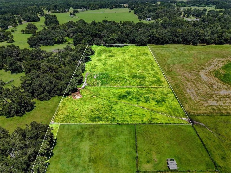 На продажу: $325,000 (4.96 acres)