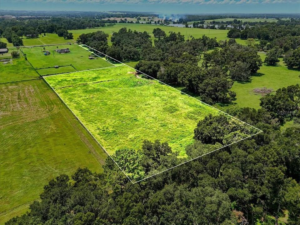 На продажу: $325,000 (4.96 acres)