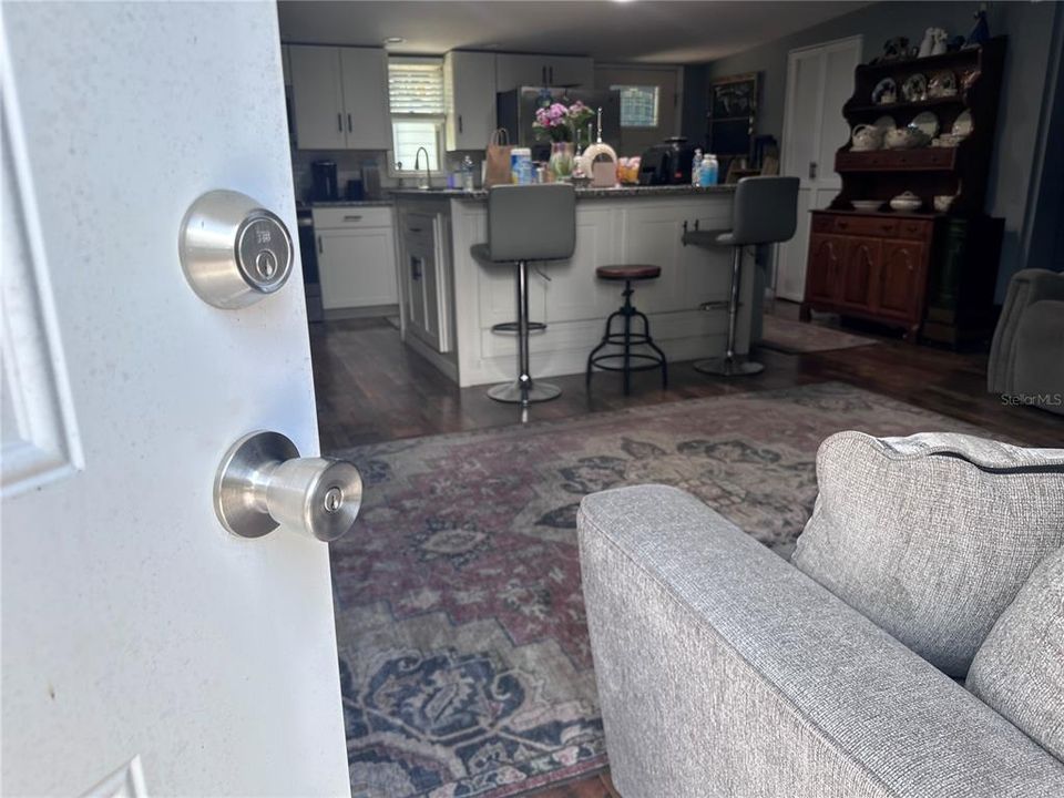 Upon entering the home.