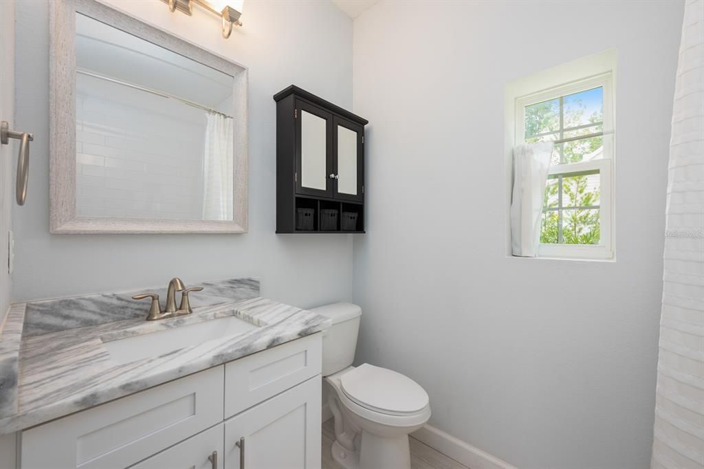A well-appointed full guest Bathroom complements the extra bedrooms and main living spaces.