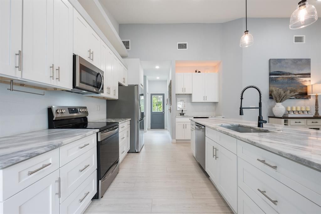 Whether you're cooking, baking or entertaining, the spacious Kitchen is a welcoming hub for gathering with family and friends.