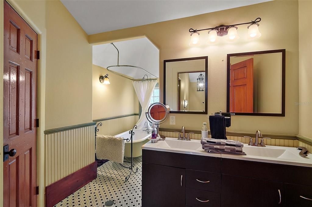 bathroom upstairs, clawfoot tub/shower and dual sinks, also water closet not shown here has its own sink vanity.