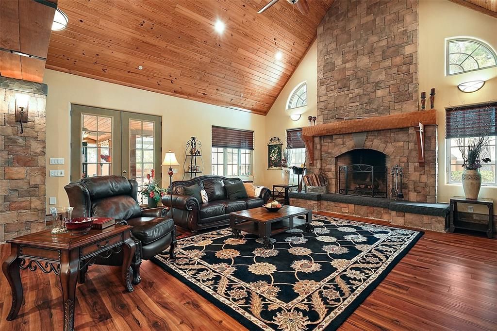 The french doors lead to the covered lanai. This great room is perfect for relaxing and entertainig.