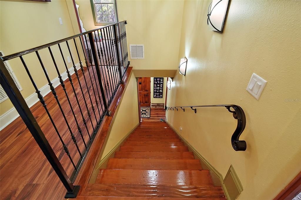 staircase to 3 bedrooms and one bath