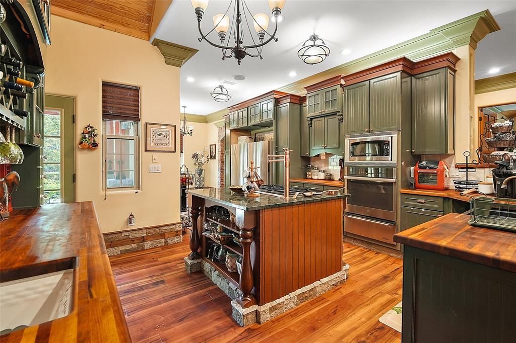 European rustic aesthetics create a show stopping look-8 burner gas cooking island