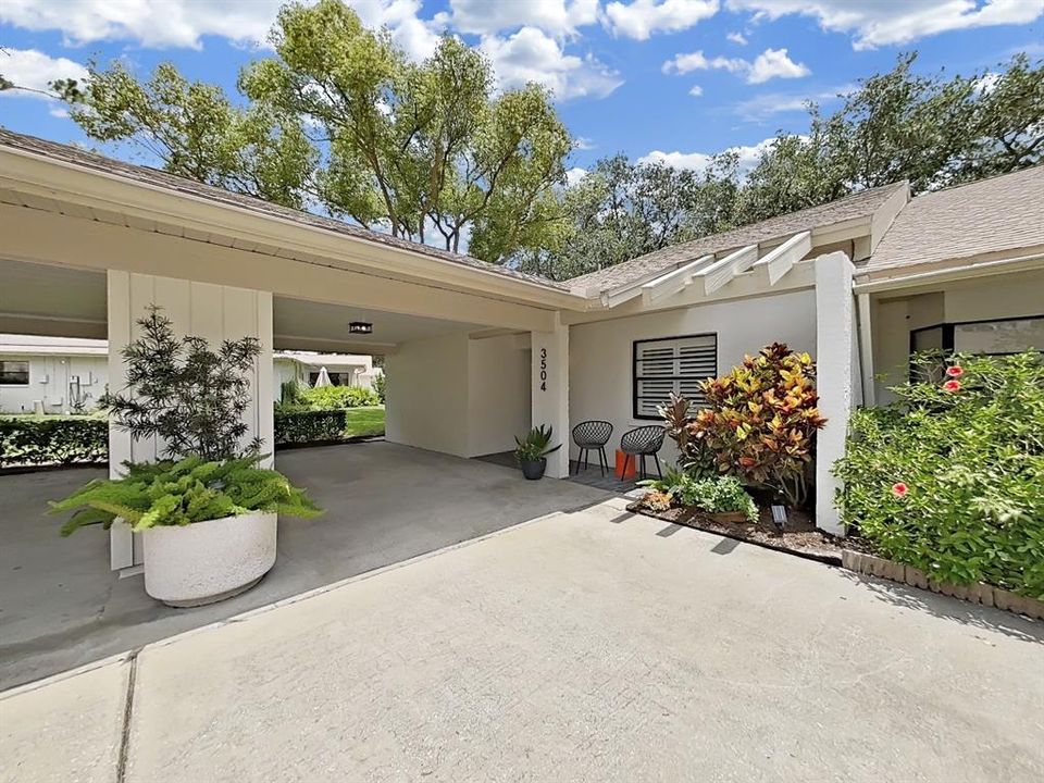 Beautiful Villa with 1-Car attached Carport in the SOCIALLY ACTIVE & GUARD-GATED Seven Springs Golf & Country Club Community.