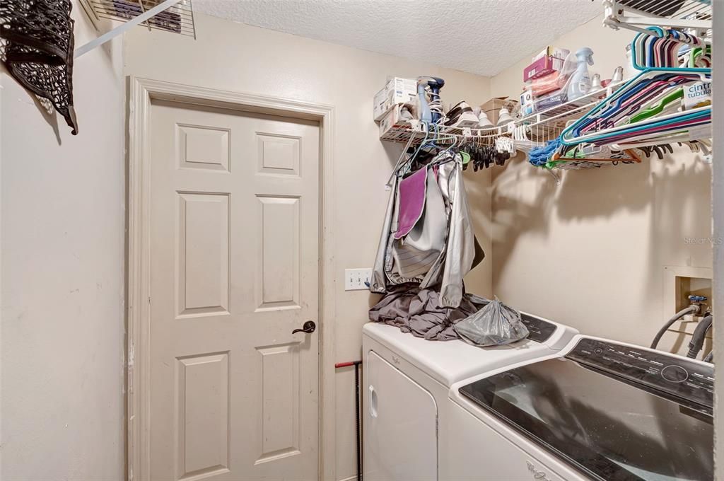 Laundry room with access to the garage