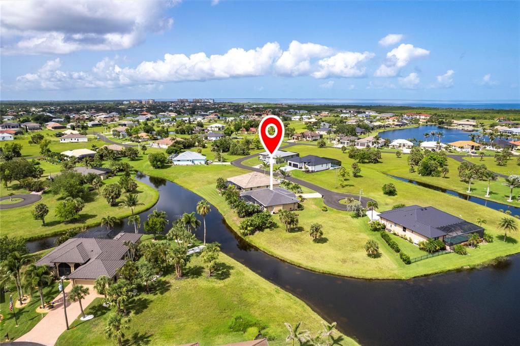 Over 100 Ft of waterfront plus long (300+ Ft) intersecting canal view.