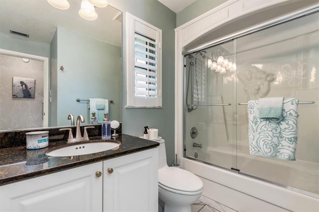 Second bath has a shower tub combo