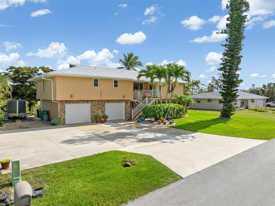 The extended driveway will accomodate your RV and has 30/50 hookups