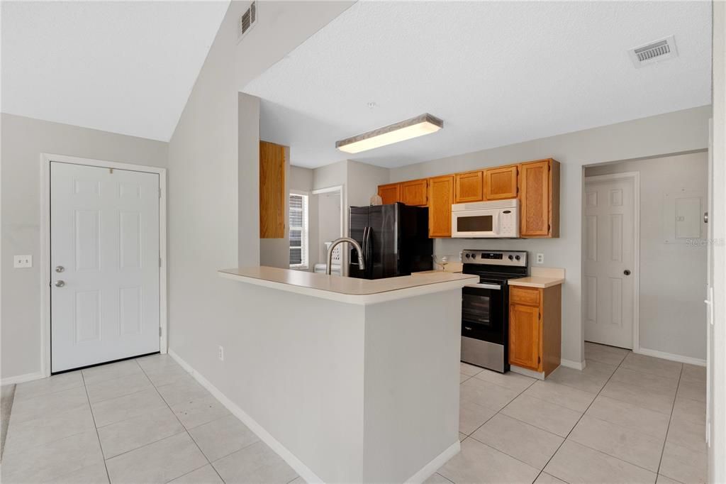 The kitchen from a dining room view