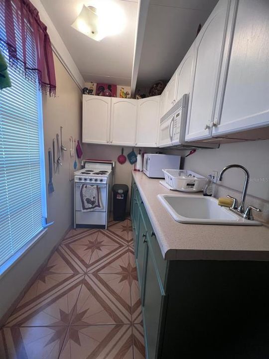 待售: $88,000 (1 贝兹, 1 浴室, 648 平方英尺)