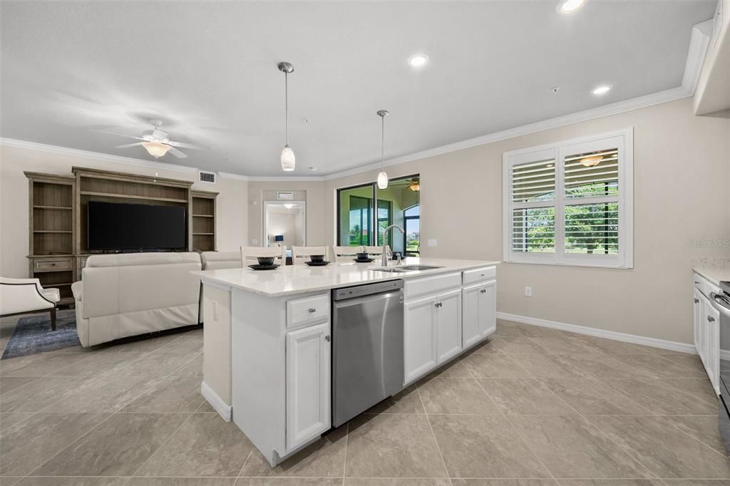The Kitchen features a Quartz Island with Breakfast Bar