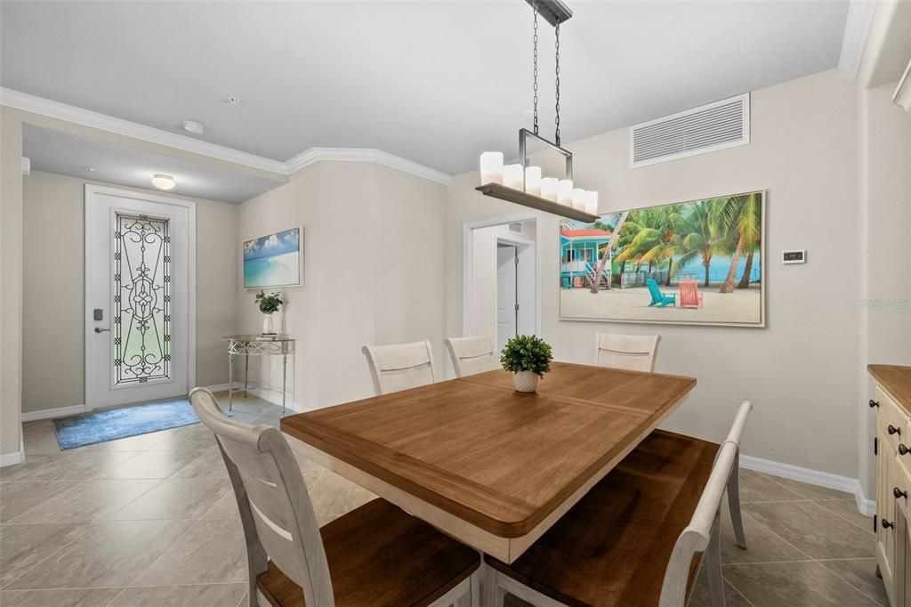 Dining room and elegant glass door entry