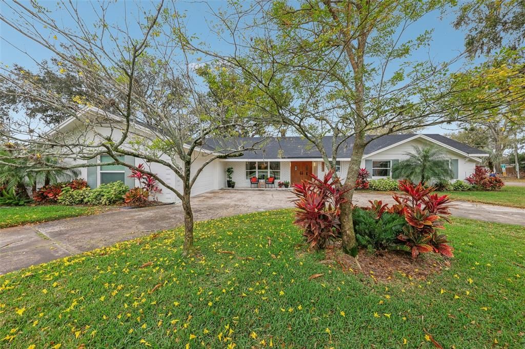Two car side entry garage with circular driveway