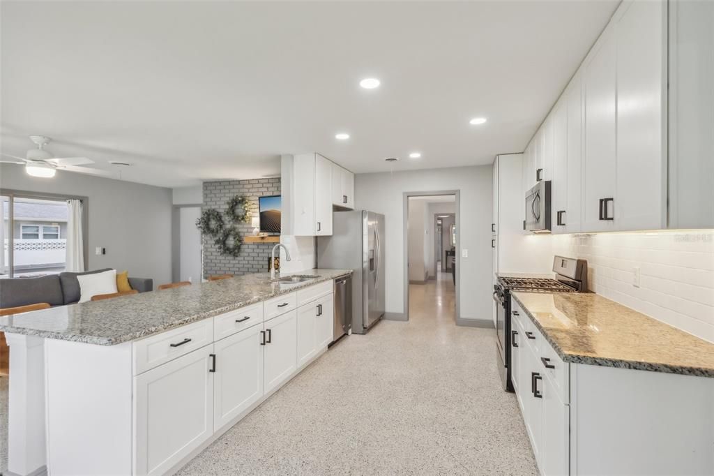 Kitchen features tons of storage and counter space