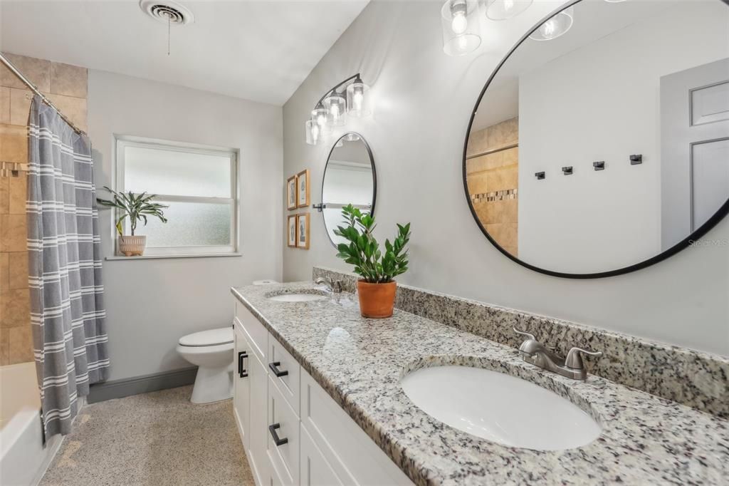 Secondary bathroom with double sink vanity