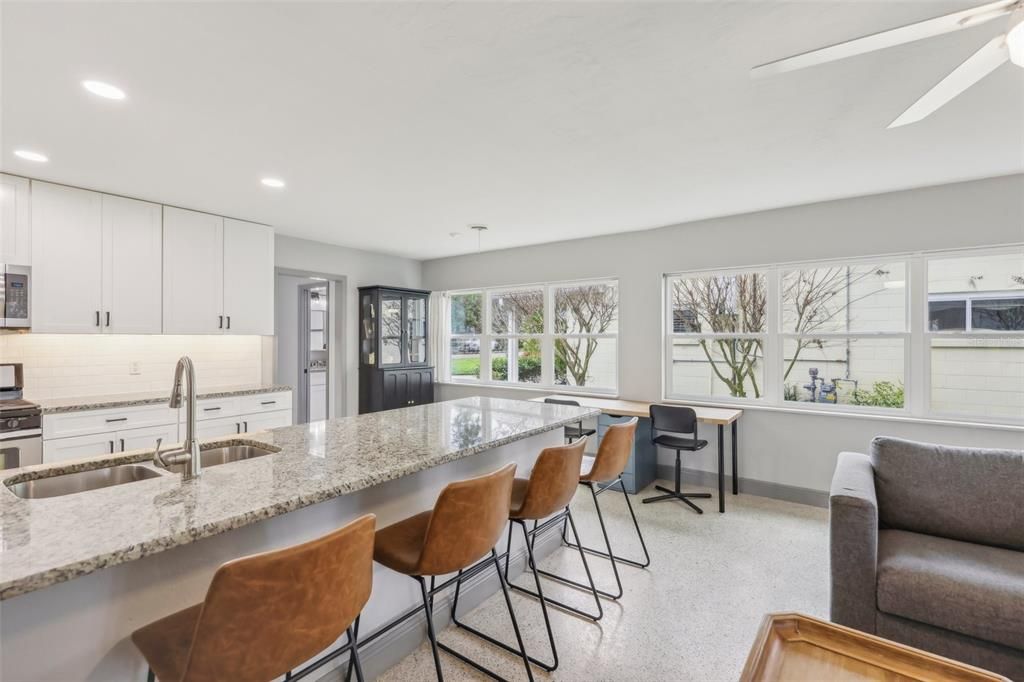 Kitchen with nearby half bath and spacious laundry room