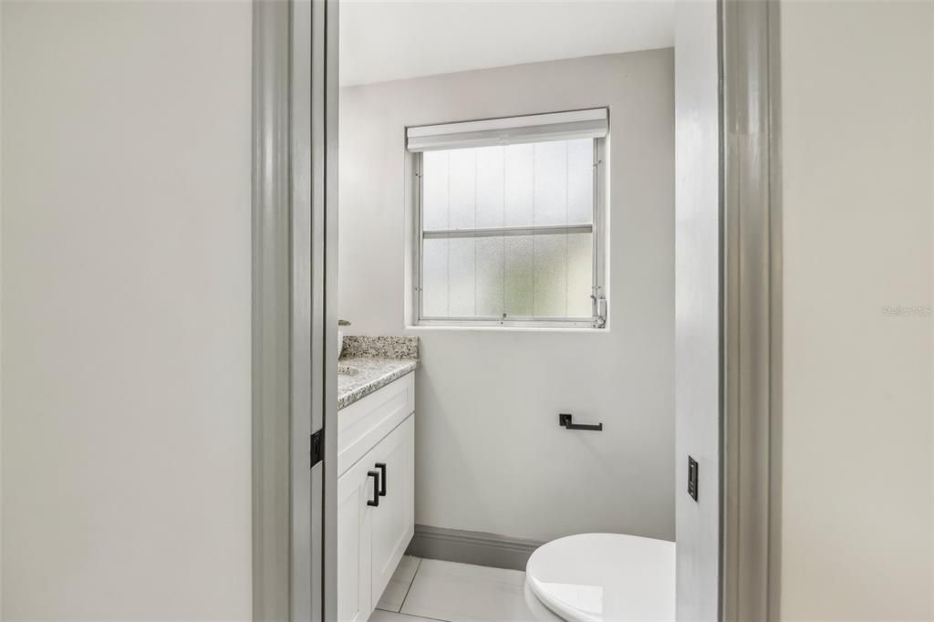 Half bath conveniently located off the kitchen