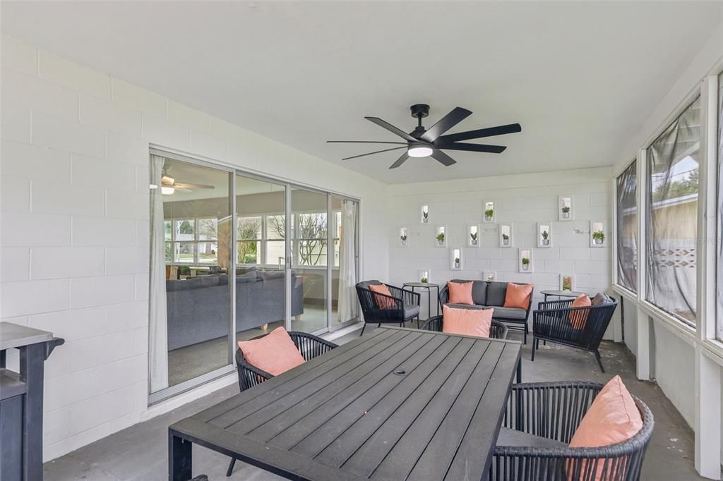 Screen room with sliding doors leading into the family room