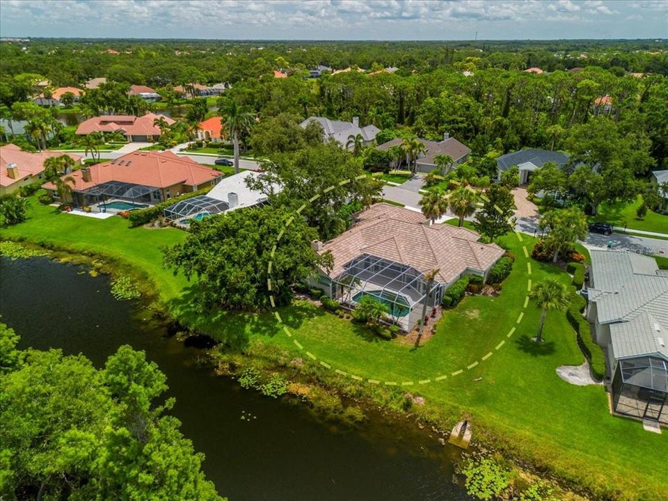 Fabulous 0.31 lot with lake views surrounded by tropical foliage.