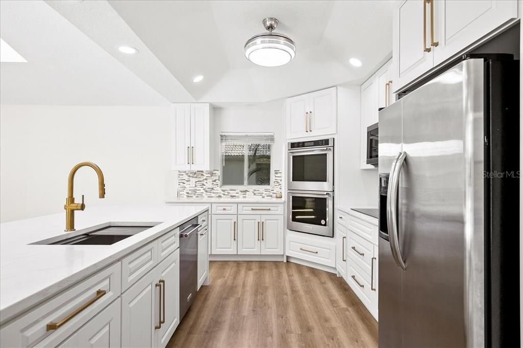 New oven, dishwasher, cooktop and microwave.  Soft close cabinetry.