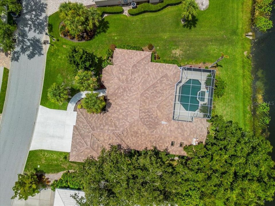 Large lot provides plenty of green space between neighbors with water and preserve behind.
