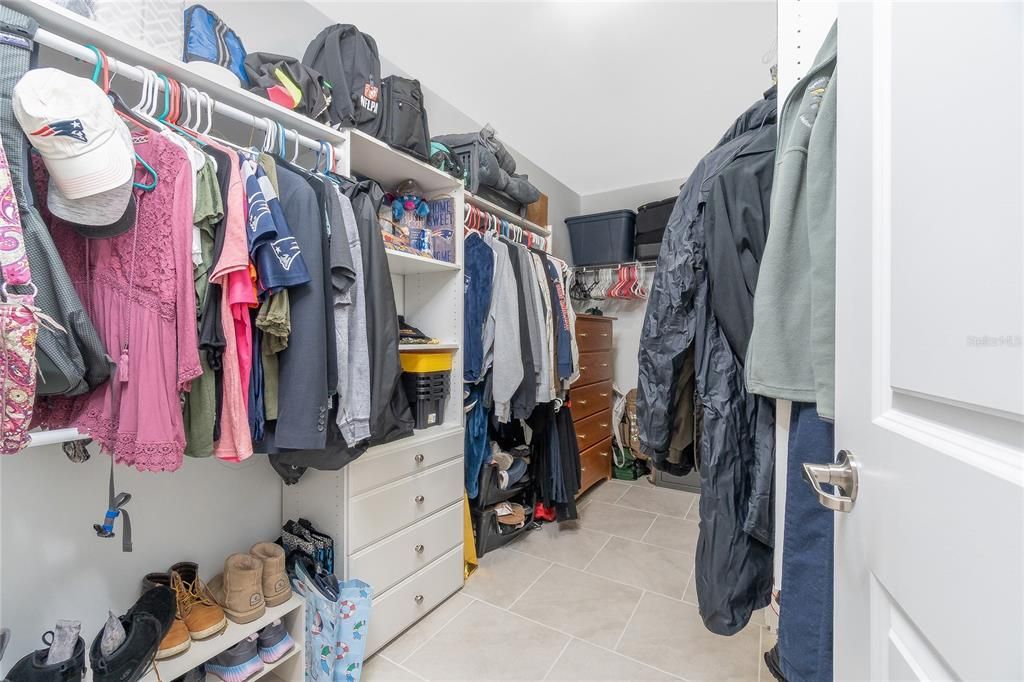 PRIMARY WALK IN CLOSET WITH CUSTOM SHELVING