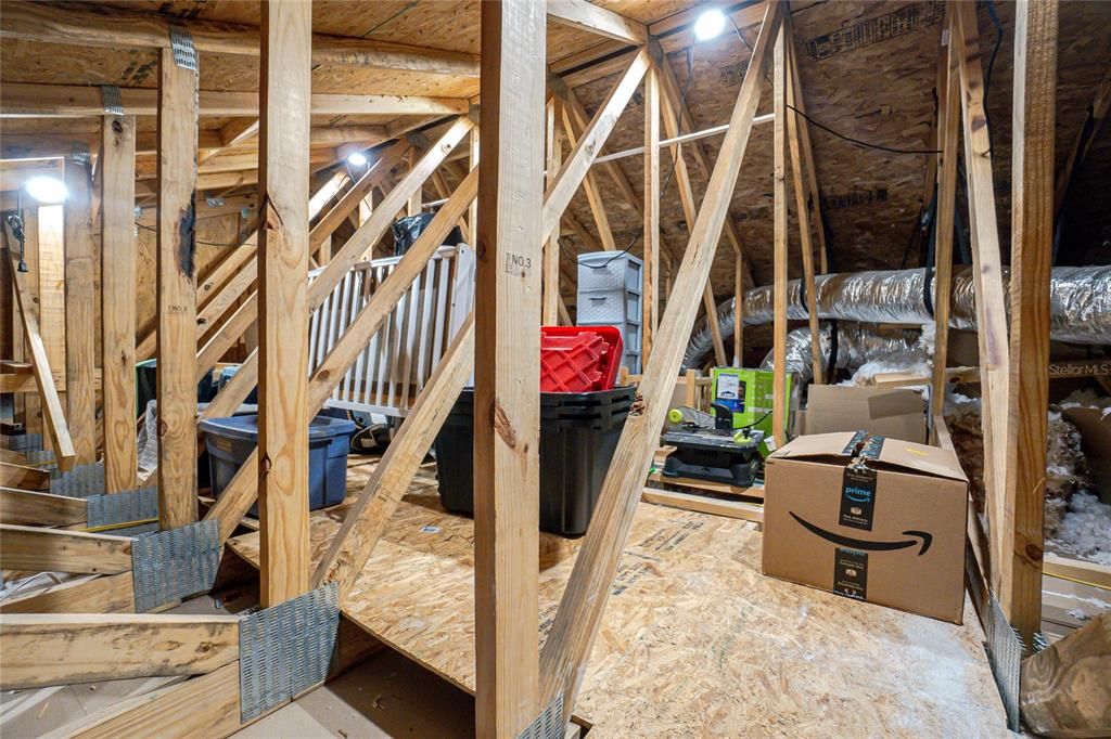 ATTIC WITH UPGRADED LIGHTING AND FLOORING