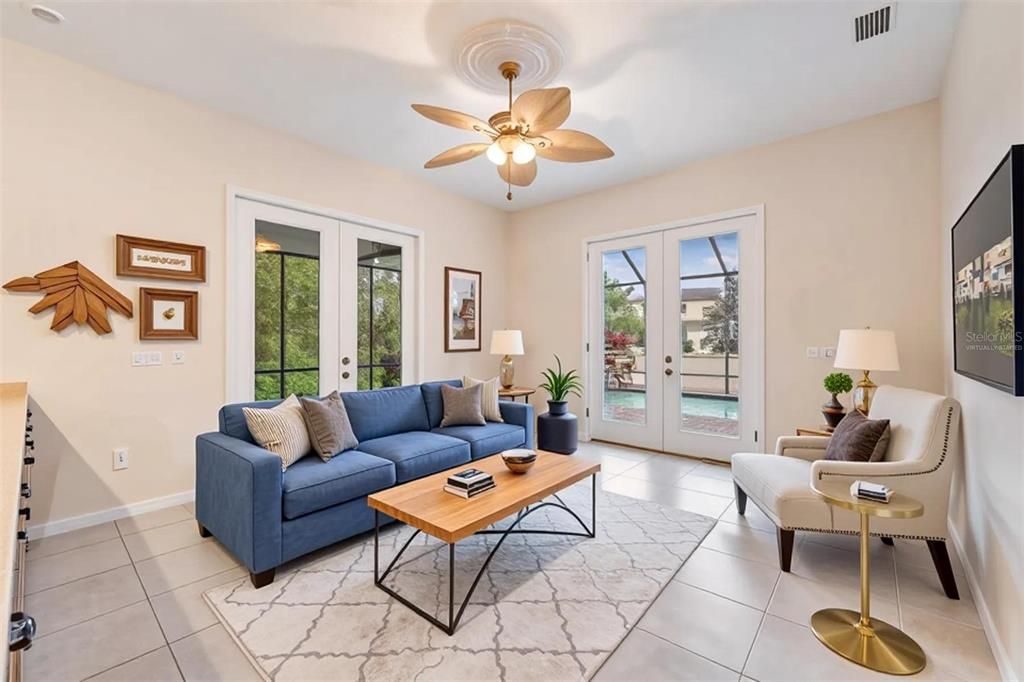 virtually staged family room off kitchen