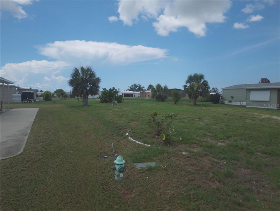 Active With Contract: $33,500 (0.18 acres)