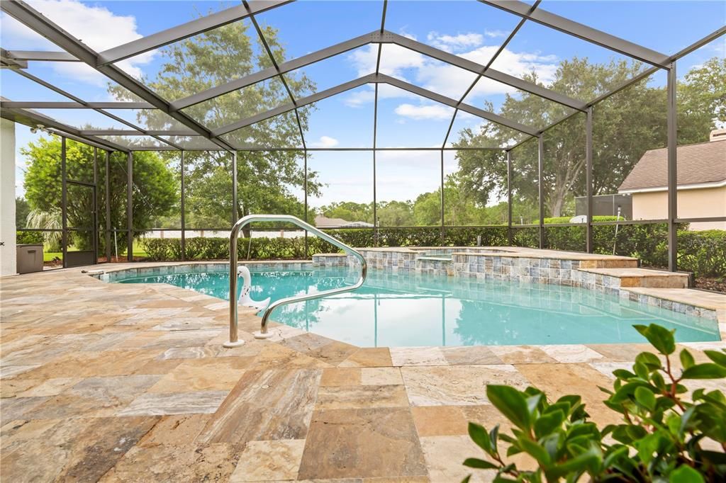 Travertine Pavers & Resurfaced Pool