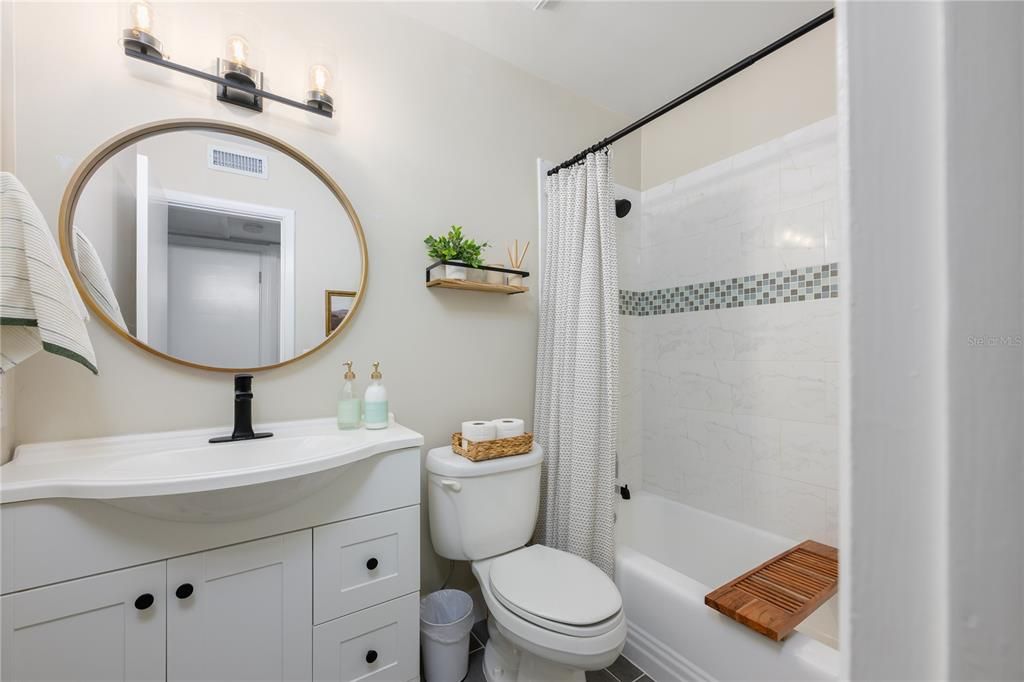 Updated second bath. Big linen closet outside bath.