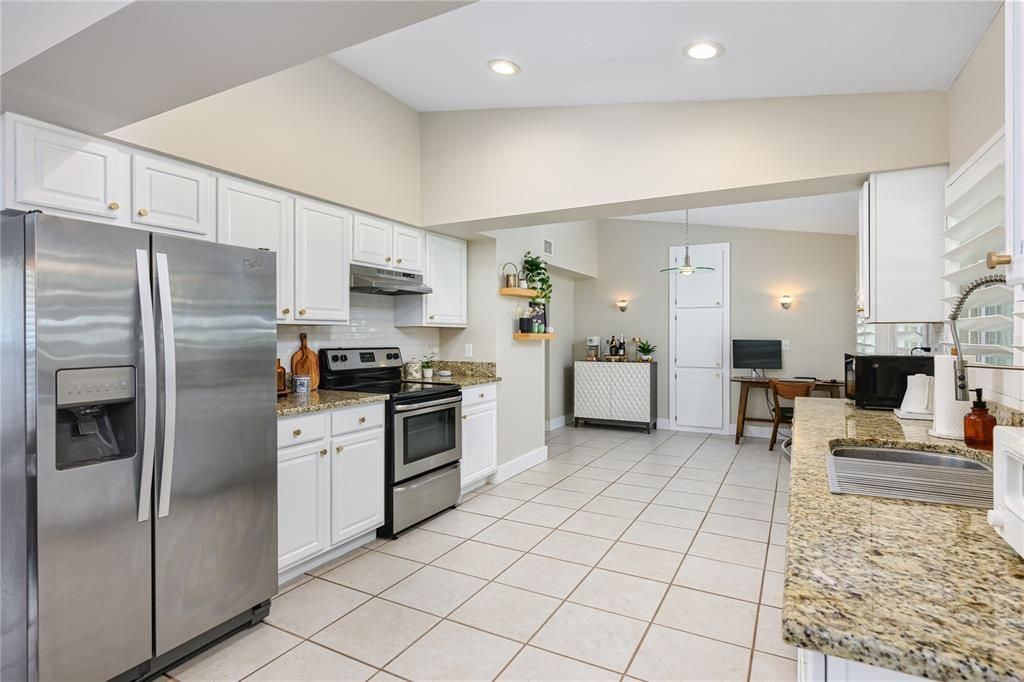 Kitchen with eat in space.
