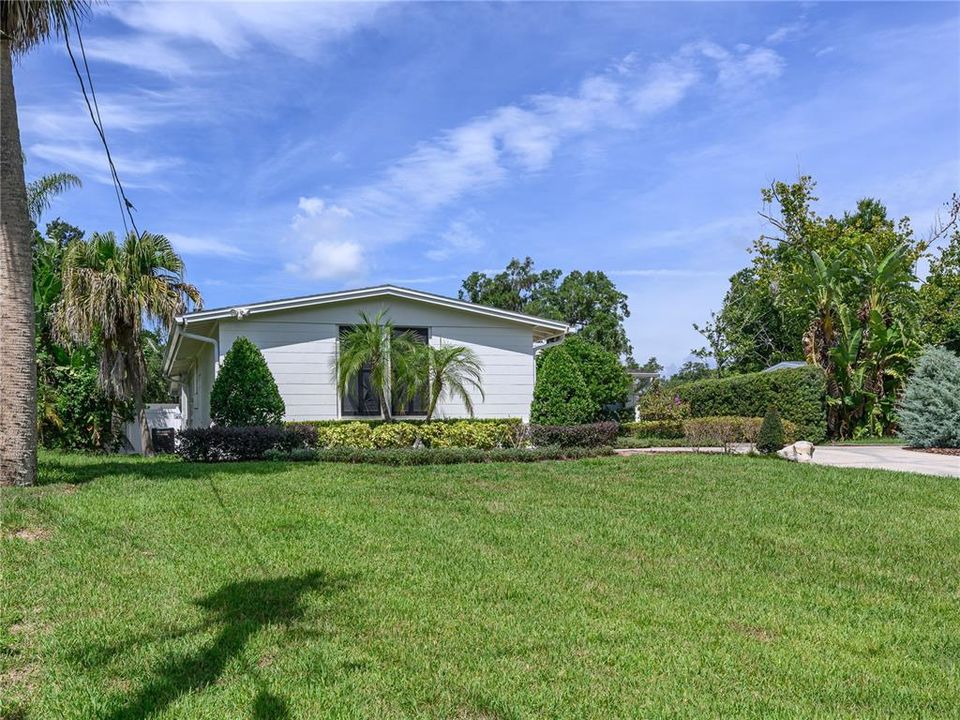 Left side of home with side entry 2 car garage.