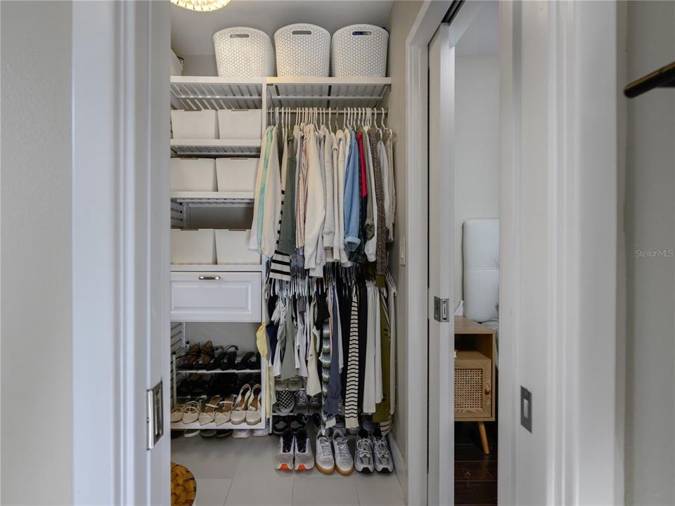 walk in custom closet with heated floors.