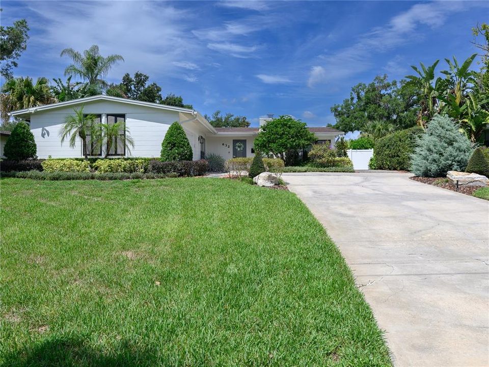 Stunning curb appeal with elevated lot.